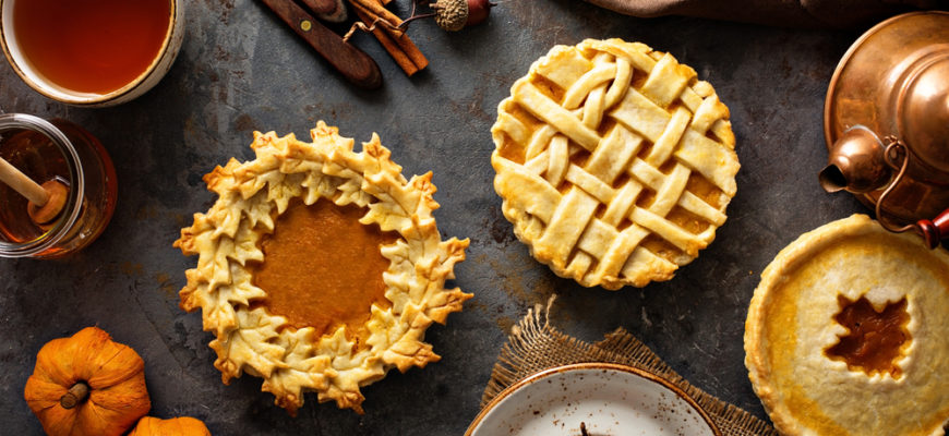 Homemade,Pumpkin,Pies,Decorated,With,Fall,Leaves,Overhead