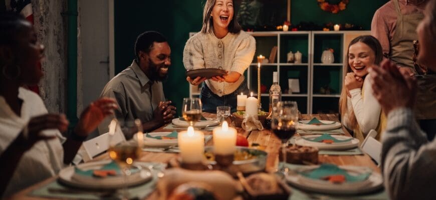 Happy,Multi,Ethnic,Friends,Laughing,And,Enjoying,A,Festive,Thanksgiving